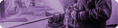 A person cutting a metal rod
